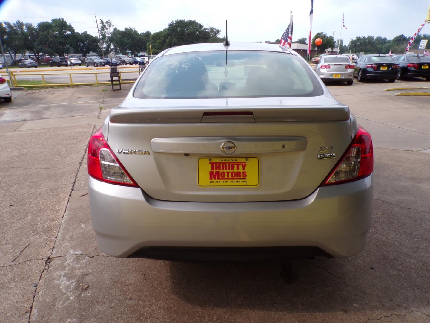 2018 Nissan Versa 1.6 SL Sedan (3N1CN7AP0JL) with an 1.6L L4 DOHC 16V engine, CVT transmission, located at 16710 Clay Rd., Houston, TX, 77084, (281) 859-7900, 29.834864, -95.656166 - Photo#4